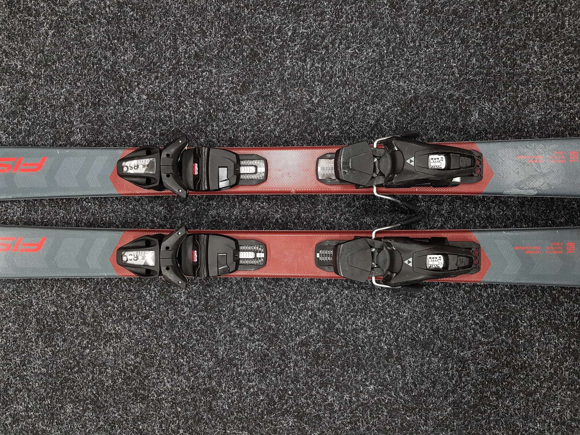 Použité lyže FISCHER Fire + viazanie Fischer RS 9
