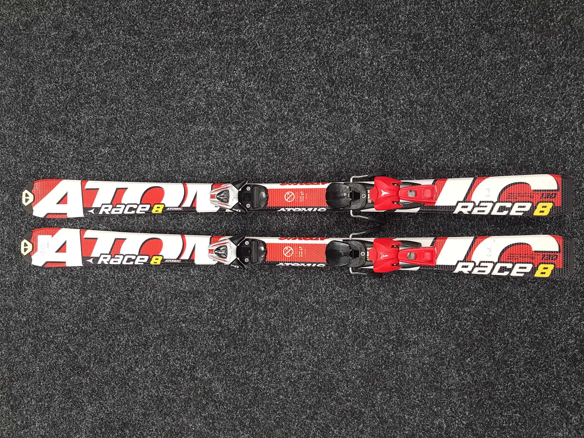 Použité detské lyže ATOMIC Race 8 + viazanie Atomic Evox 7