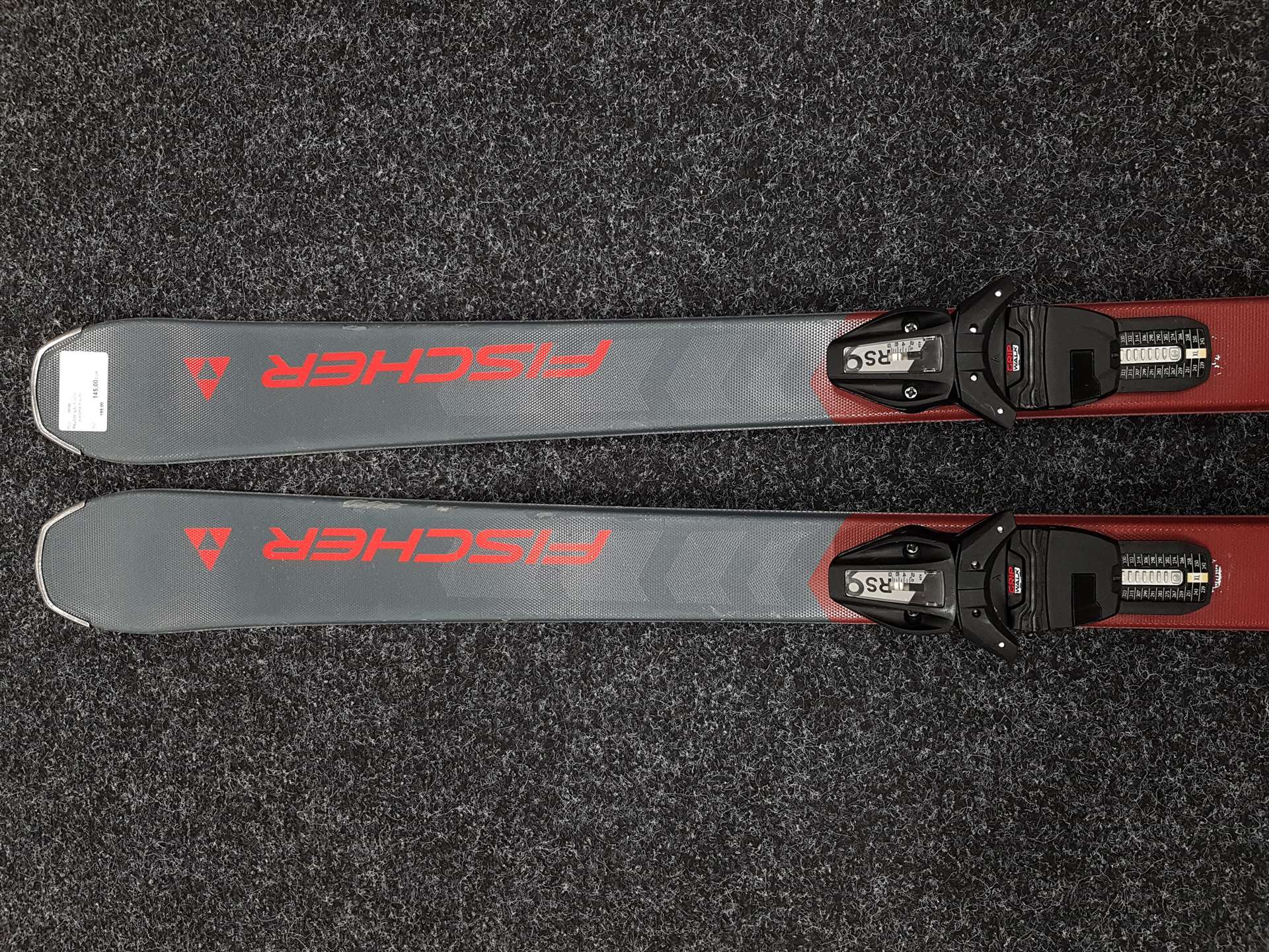 Použité lyže FISCHER Fire + viazanie Fischer RS 9