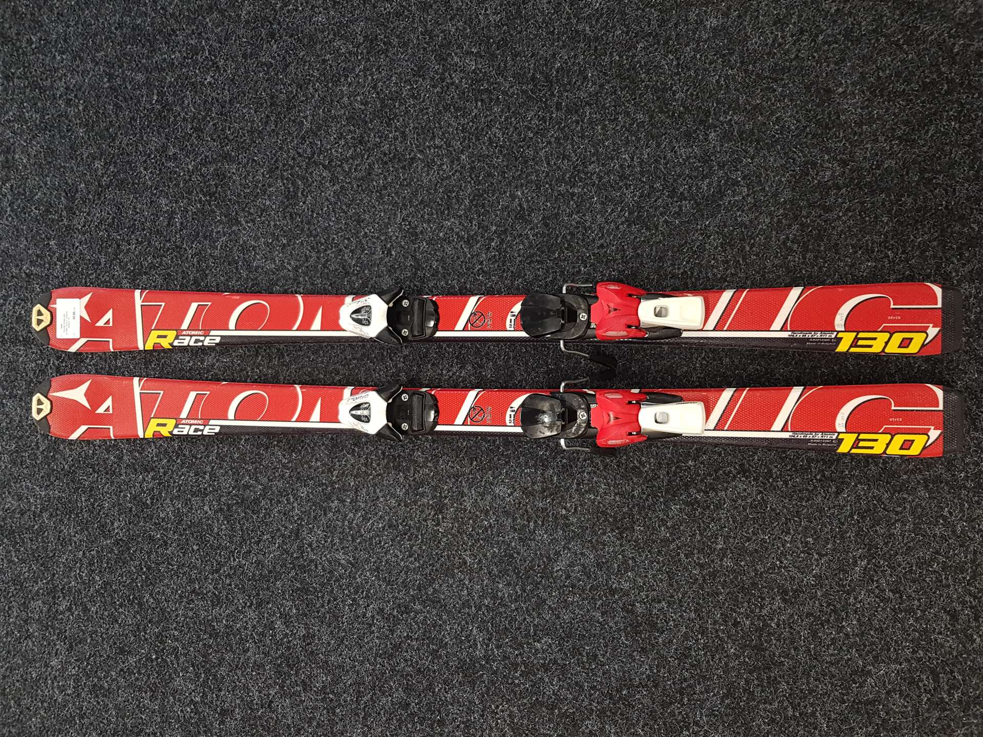 Použité detské lyže ATOMIC Race + viazanie Atomic 7,5