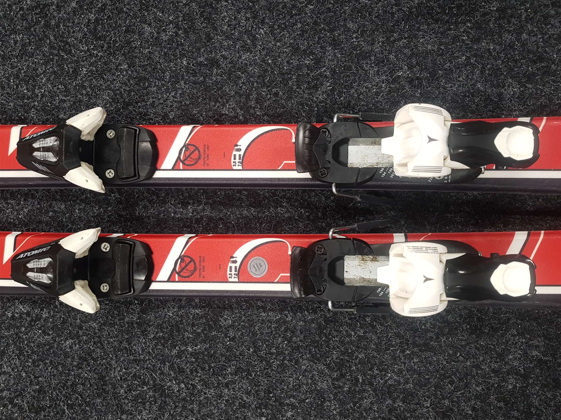 Použité lyže ATOMIC Race + viazanie Atomic EvoX 4,5