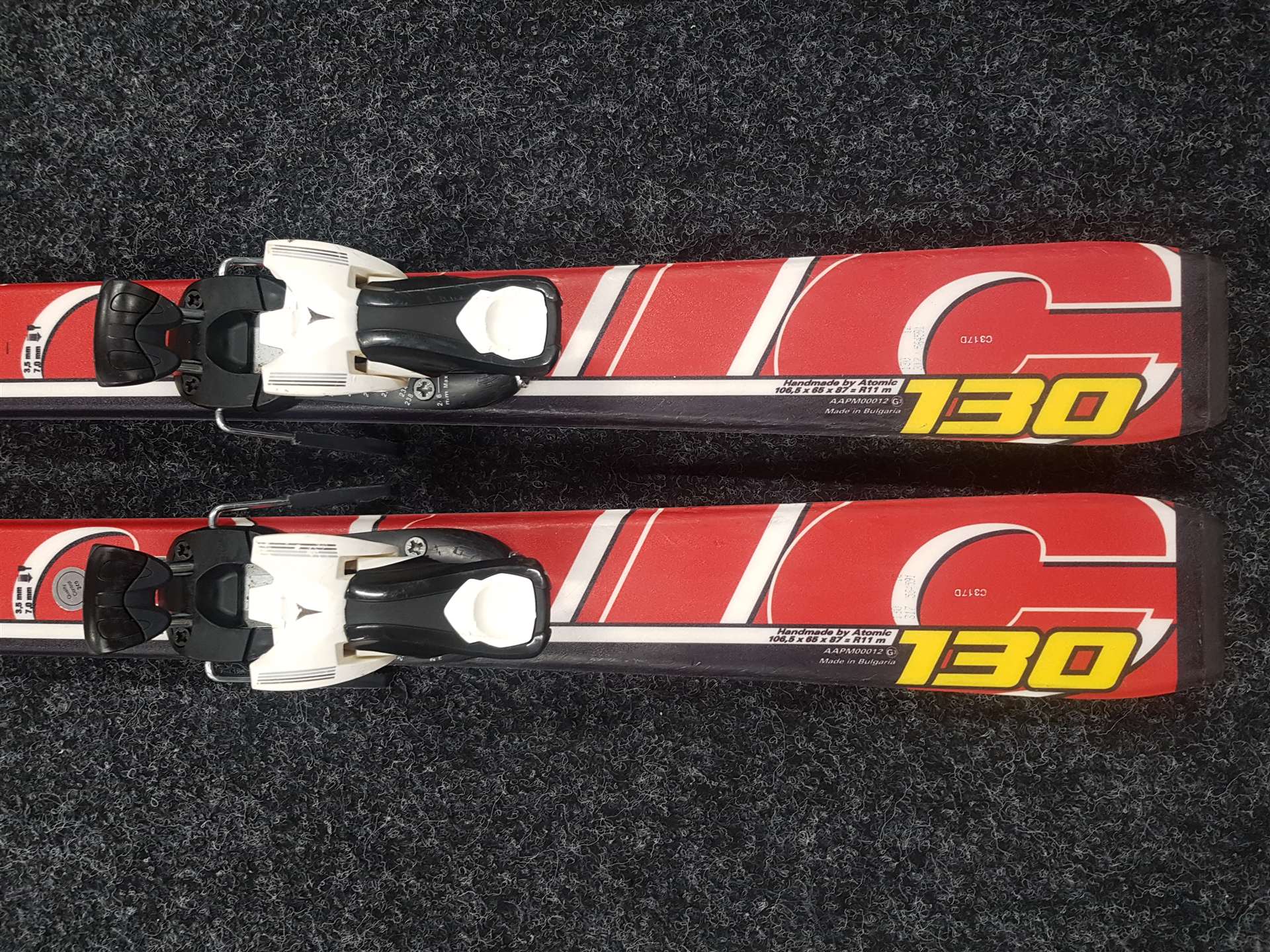 Použité lyže ATOMIC Race + viazanie Atomic EvoX 4,5