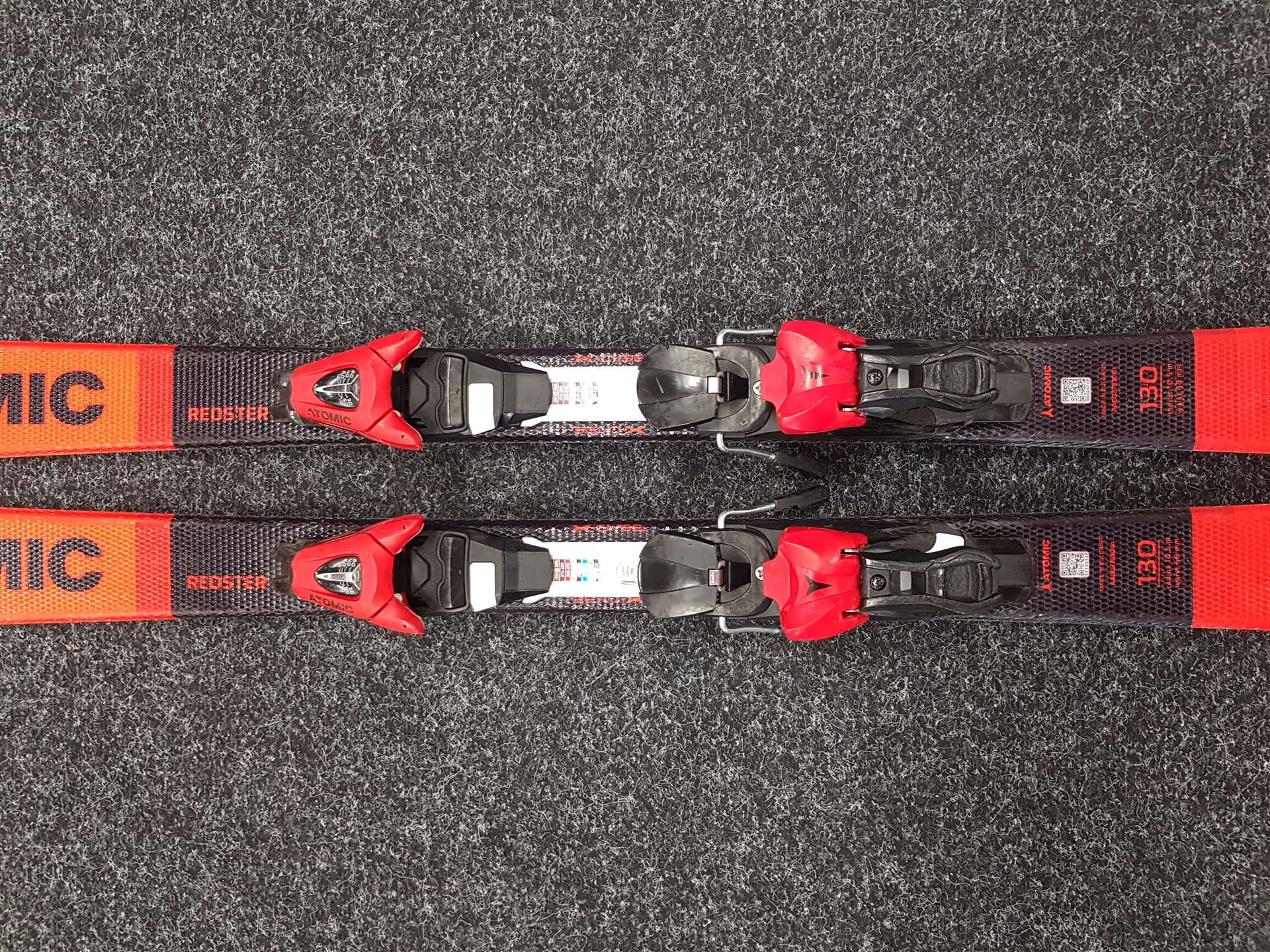 Použité detské lyže ATOMIC Redster J2 + viazanie Atomic L7