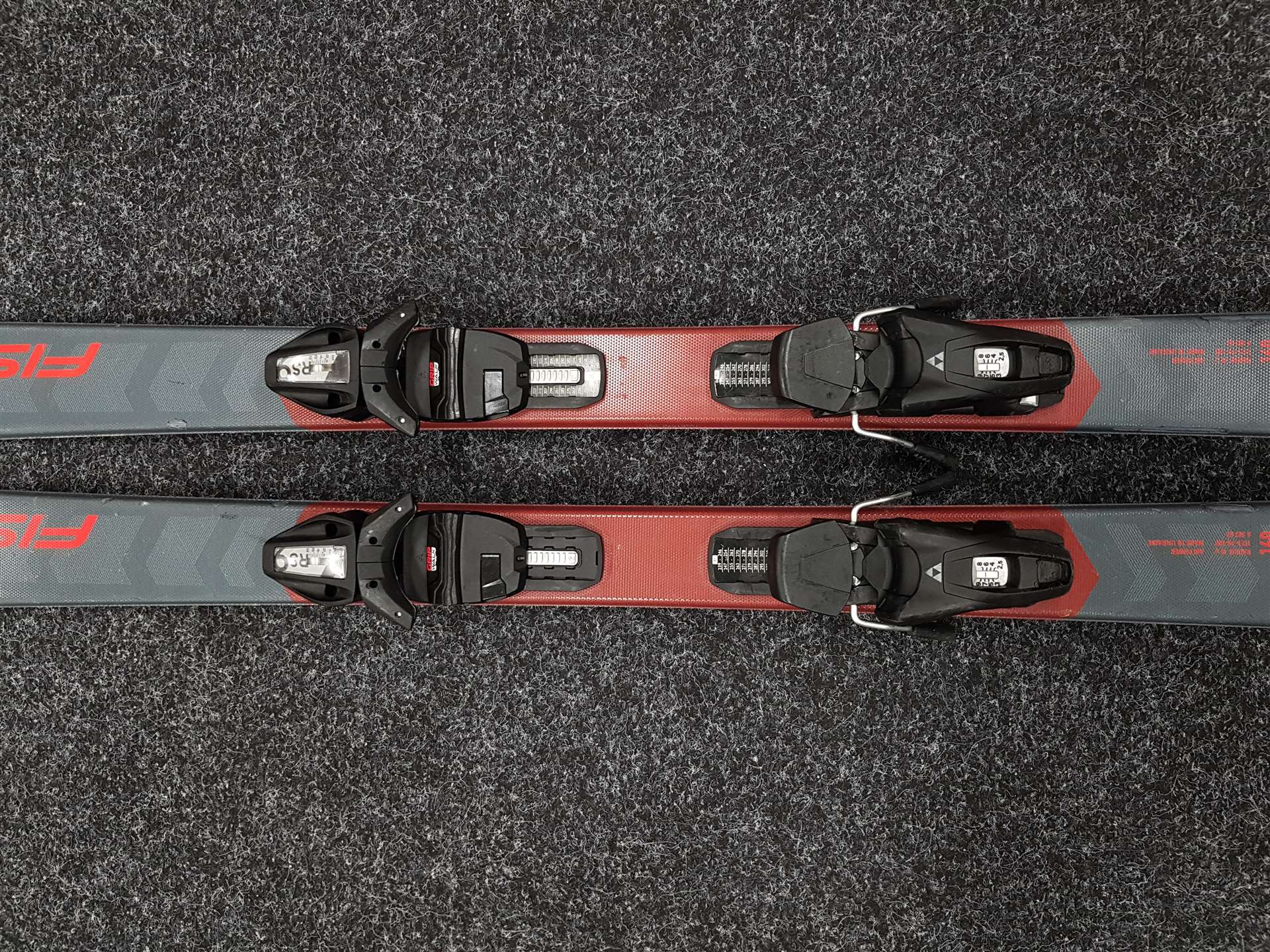 Použité lyže FISCHER Fire + viazanie Fischer RS 9