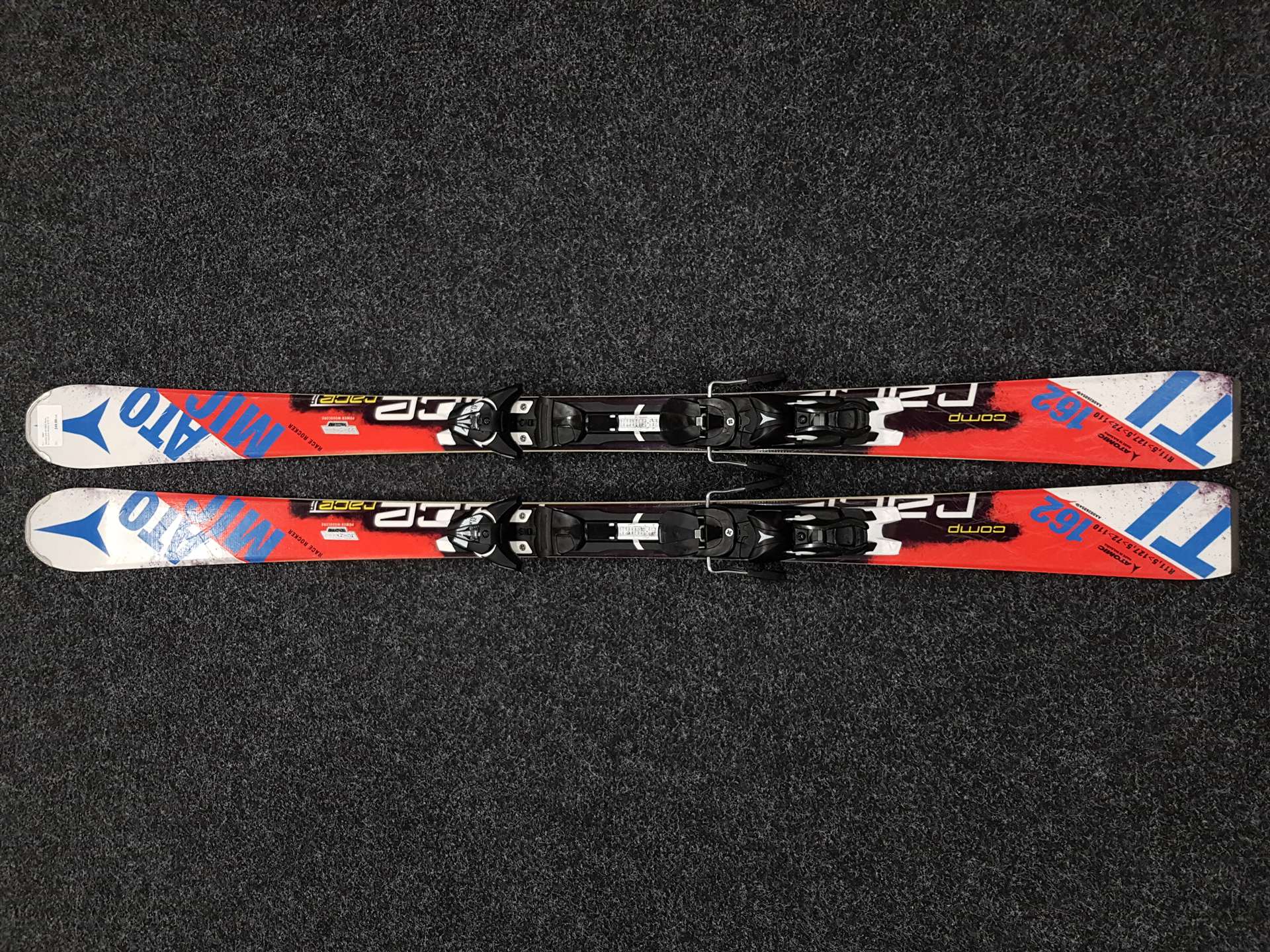 Použité lyže ATOMIC Race Ti + viazanie Atomic XTO 12