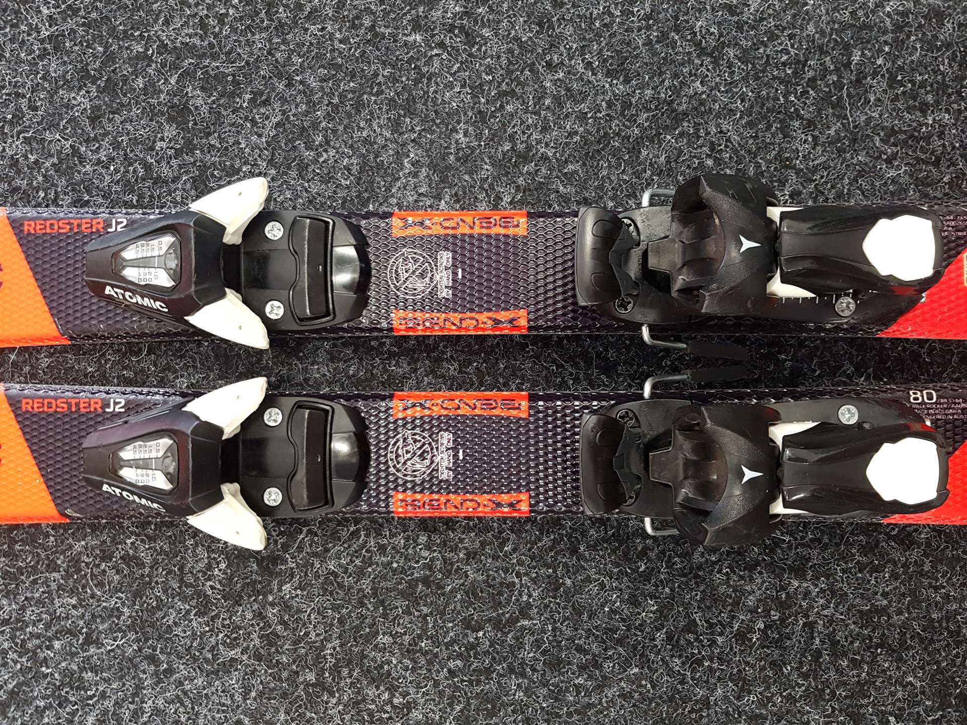 Použité detské lyže ATOMIC Redster J2 + viazanie Atomic C5